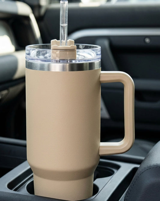 Tevnx Vacuum Insulated Travel Tumbler 24 fl oz Sandstone Handle and Straw Lid - Lifestyle view
